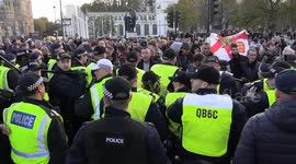 Remembrance Day protesters attempt to brake police line stopping access to Whitehall after Orange march goes in.