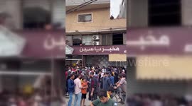Palestinians Line Up For Bread in Gaza