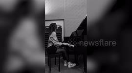 Pianist with crippling stage fright braves catwalk to become beauty queen finalist