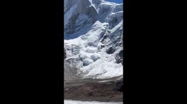 Avalanche rumbles down Himalayan slope