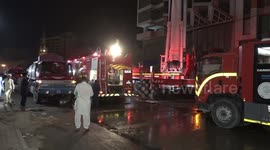 Fire in multi-storey building extinguished in Karachi, Pakistan