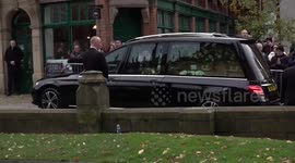 Sir Bobby Charlton's coffin is carried into Manchester Cathedral, UK