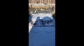 University Students Creatively Embrace Winter with Paintings on Snow in Northern China