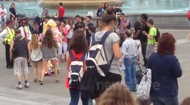 Crazy man wears post-it dress and fights | Trafalgar Square,