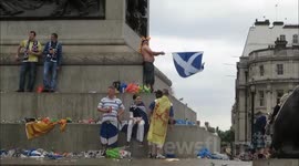 The Scottish Tartan Army Descend On Trafalgar Square.