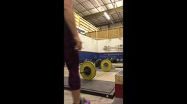 Woman lifting weight - snatch 54kg