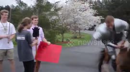 Student, dressed as knight, asks girlfriend to prom on horse and falls off spectacularly