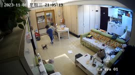 Son's playful mishap: a candid moment captured at home in Guangdong, China