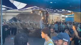 Desperate Measures: Injured and Deceased Carried on Bulldozers as Al-Shifa Medical Hospital Struggles to Cope with Gaza’s Humanitarian Crisis.