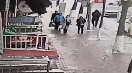 Icicle lands on pedestrian's head knocking him out in China