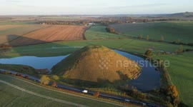 Amazing horse-shoe moat forms around the ancient Silbury Hill at Sunrise