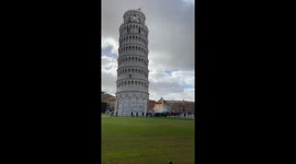 Protesters at the tower of pisa this morning at 11:30. Protesters trying getting in the tower. Security acting quickly to close the doors.