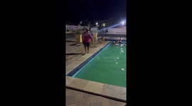Older Woman Backflips Into Swimming Pool