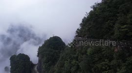 China's famed Tianmen Mountain shatters tourist number record