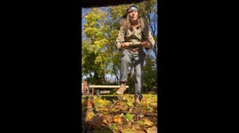 Canadian woman dances Hip Hop in the sun shine in a play park