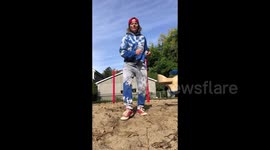 Dancing old fool practices strutting her stuff and stacking moves in the park