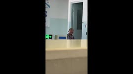 Adorable boy smiles and winks at his friend recording him