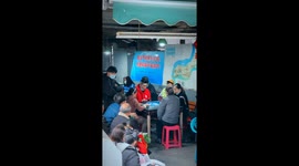 Intriguing Mahjong Gathering Under the Light Rail in Southwest China