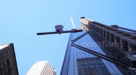 Final steel beam raised at JP Morgan Chase new global headquarters in NYC, USA