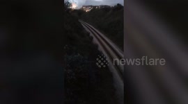 Christmas is coming! Neon-covered train lights up Devon valley