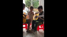 Harmonious strings: father and son unite in musical mastery