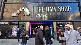 Madness fans wait patiently for a glimpse of their idols at newly opened HMV Oxford Street store due to overcrowding