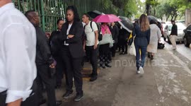 Workers at the Taylor Swift Show wait in line at the Allianz Parque football stadium in Sao Paulo, Brazil