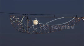 Nearly full Beaver Moon seen rising in Kent, UK