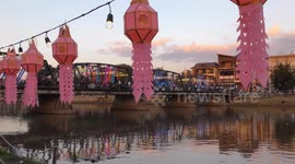 Thailand's festival of water and lights at the Ping River in Chiang Mai attracts thousands