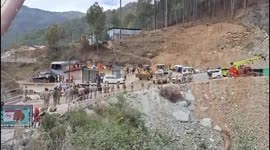 Rescuers Reach Trapped Tunnel Workers in India