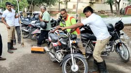 Baby cobra pulled out from inside motorbike at government office in India