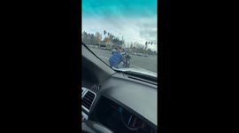 Terrifying video of man attacking motorcyclist before pulling a gun on him, in Tacoma, Washington