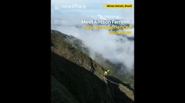 Athlete Walks Between Two Mountains