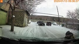 Fast Reflexes Save Man From Sliding Car