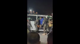 Crowd chants as Israeli hostages handed over from Hamas to the Red Cross in Gaza