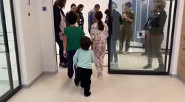 Israeli children reunite with family dog weeks after being taken hostage by Hamas