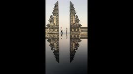 Couple take romantic photos at Bali 'Gates of Heaven' replica in northern Thailand