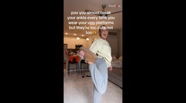 Fashionista aims for infinite style despite risk of twisting her ankle in trippy shoes