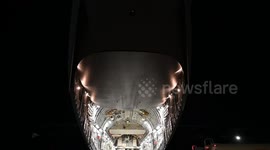 Airmen load cargo on C-17 Globemaster III