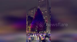NYC's Rockefeller Center Sparkles: Christmas Tree Illuminated in Grand Celebration in New York, NY, USA