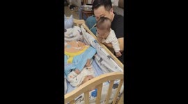 Adorable moment infants babble at each other