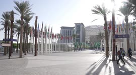 People arrive at Cop28 on second day of climate negotiations in Dubai, UAE