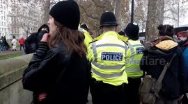 Just Stop Oil protesters hold rally outside New Scotland Yard in London, UK
