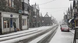 Ambleside Village, Cumbria, U.K. Slowly grinding to a halt. As the snow falls thick and fast.