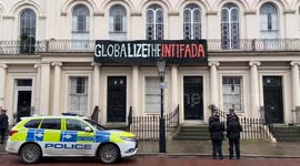 Squatters hang a banner calling for a global intifada outside a building near Regent’s Park
