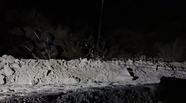 Officials rescue driver after truck falls into ditch in Uttarakhand, India