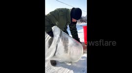 Innovative couple in China transforms plastic barrel into natural ice refrigerator