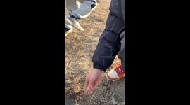 Bucket blown up by firecracker inside precisely hits the person who lights it in China