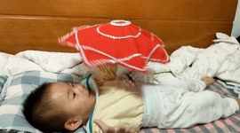 Chinese baby shows off surprising talent with twirling handkerchief