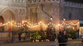 Princess of Wales Kate Middleton waves to crowds as she leaves Westminster Abbey after Christmas service